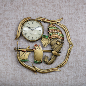 wall clock with an artistic design inspired by Indian culture